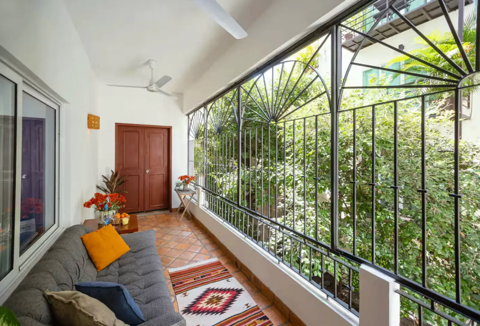 Private balcony surrounded by tropical greenery