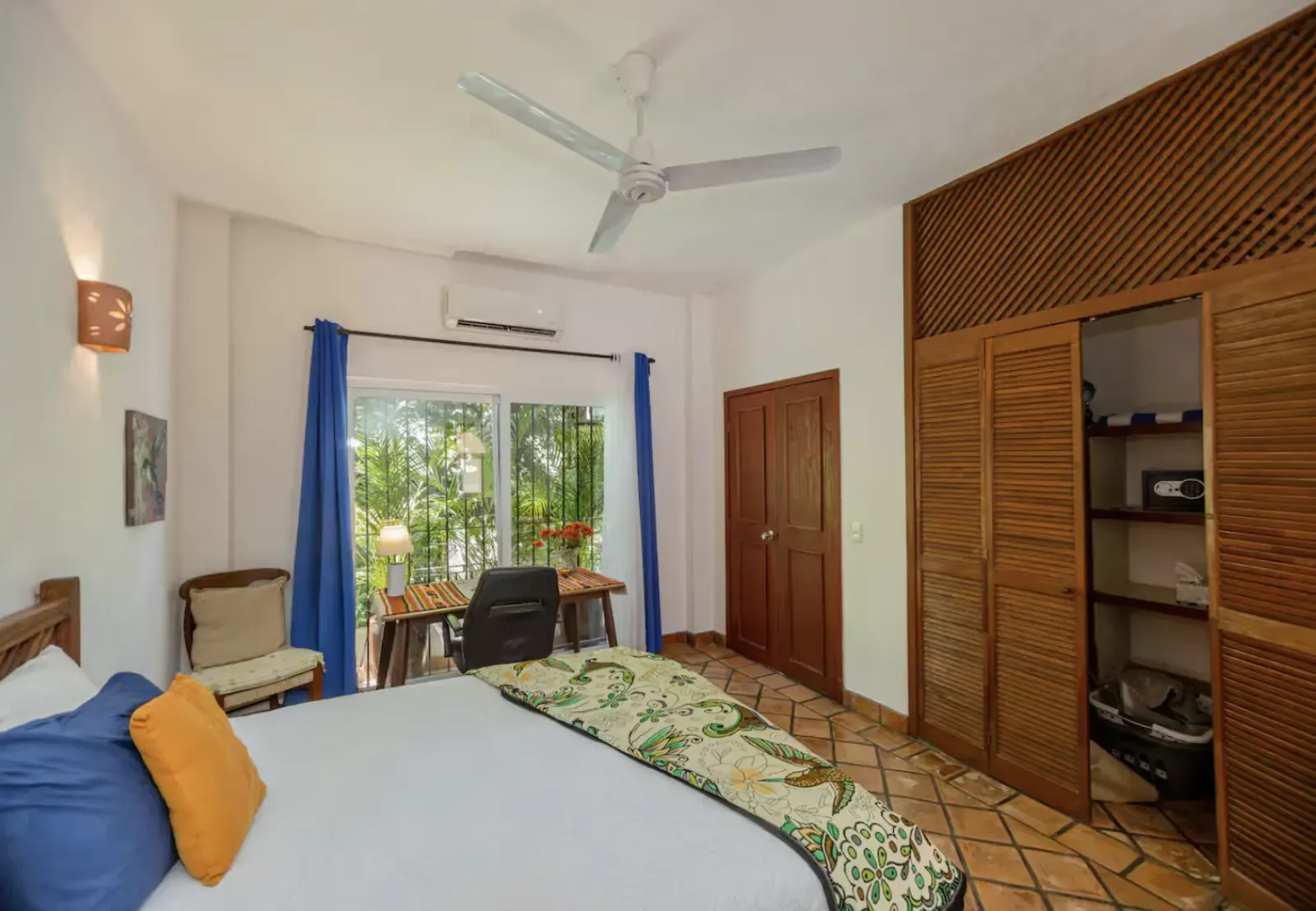 Queen bedroom with desk and closet